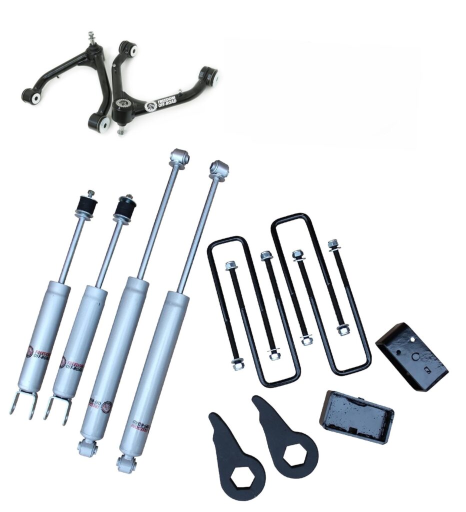 Freedom Off-Road 1-3" Leveling Lift Kit components including control arms, shocks, U-bolts, torsion keys, and lift blocks for 4x4 vehicles.